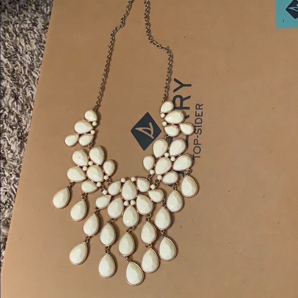 White bib necklace